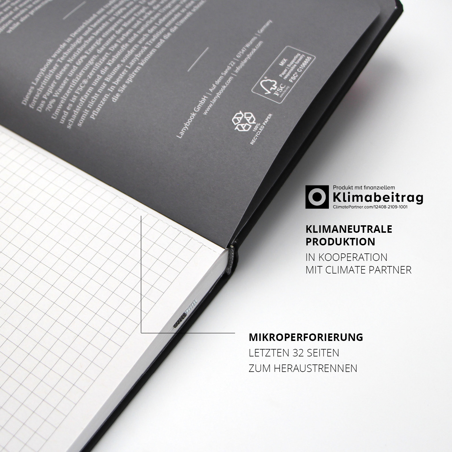 Innenseite des Lanybook® mit FSC-Zertifikaten, ClimatePartner-ID für klimaneutrale Produktion und perforierten Seiten zum Heraustrennen.