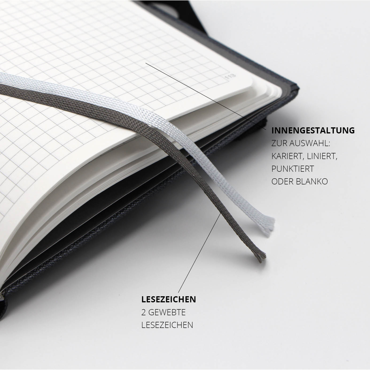 Zwei gewebte Lesezeichen im Lanybook Notizbuch zur schnellen Orientierung und Markierung wichtiger Seiten